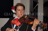 MEXICO, Mexico City, Mariachi playing violin, MEX765JPL
