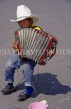 MEXICO, Mexico City, boy playing accordion (street entertainer), MEX128JPL