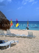 MEXICO, Yucatan, Playa Del Carmen, sunfish sailboats and sunbeds on beach, MEX251JPL