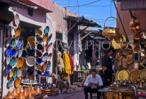 MOROCCO, Marrakesh, Medina (old town) souk, ceramic and copperware shop, MOR77JPLA