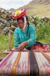 PERU, Chupani, Andean Mountains, traditional textile weaving, woman working with loom, PER91JPL