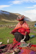 PERU, Chupani, Andean Mountains, traditional weaving, woman spinning yarn, PER42JPL