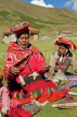 PERU, Chupani, Andean Mountains, traditional weaving, woman spinning yarn, PER69JPL