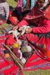 PERU, Chupani, Andean Mountains, traditional weaving, woman with balls of yarn, PER71JPL