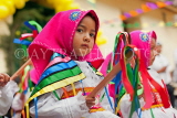 PERU, Ollantaytambo, Kindergarten child in colourful dress preforming a dance, PER87JPL