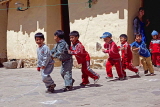 PERU, Ollantaytambo, school children forming  line for dance, PER72JPL