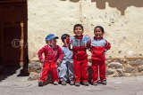 PERU, Ollantaytambo, school children posinf and smiling, PER73JPL