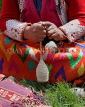 PERU, Patacancha, Sacred Valley, traditional weaving, woman spinning yarn, PER50JPL