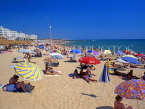 PORTUGAL, Algarve, QUARTEIRA, beach, holidaymakers and parasols, POR420JPL