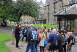 SCOTLAND, Edinburgh, visitors on free walking tour with guide, SCO953JPL