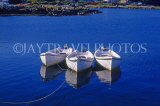SCOTLAND, Inner Hebrides, MULL island, three small boats moored, SCO806JPL