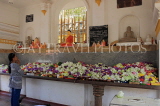 SRI LANKA, Anuradhapura, Jaya Sri Maha Bodhi (sacred Bo tree), worshipper at shrine, SLK5504JPL