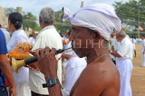 SRI LANKA, Anuradhapura, Ruwanweliseya Dagaba, musician on ceremony parade, SLK5626JPL