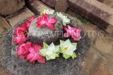 SRI LANKA, Anuradhapura, Thuparamaya Dagaba (stupa) site, lotus flower offerings, SLK5681JPL