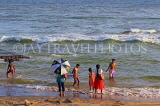 SRI LANKA, Colombo, Galle Face Green, people enjoying paddling on the beach, SLK5247JPL