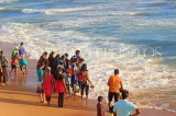 SRI LANKA, Colombo, Galle Face Green, people enjoying paddling on the beach, SLK5249JPL