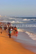 SRI LANKA, Colombo, Galle Face Green, people enjoying paddling on the beach, SLK5258JPL