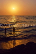 SRI LANKA, Colombo, people paddling on beach, sunset, SLK1741JPL