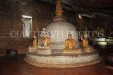 SRI LANKA, Dambulla Cave Temple (Golden Temple), Buddha statues and chedi in cave, SLK2893JPL