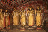 SRI LANKA, Dambulla Cave Temple (Golden Temple), row of standing Buddha statues in cave, SLK2783JPL