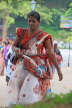 SRI LANKA, Kandy, Kandy lakeside, woman in traditional Kandyan style sari, SLK3940JPL