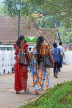 SRI LANKA, Kandy, Kandy lakeside, women in traditional Kandyan style sari, SLK3942JPL