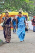 SRI LANKA, Kandy, Kandy lakeside, women in traditional Kandyan style sari, SLK3943JPL