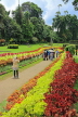 SRI LANKA, Kandy, Peradeniya Botanical Gardens, Flower Garden, and visitors, SLK4921JPL