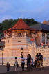 SRI LANKA, Kandy, Temple of the Tooth (Dalada Maligawa), and visitors, dusk, SLK3389JPL