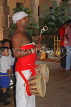 SRI LANKA, Kandy, Temple of the Tooth (Dalada Maligawa), drummer at temple ceremony, SLK3047JPL