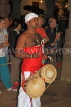 SRI LANKA, Kandy, Temple of the Tooth (Dalada Maligawa), drummer at temple ceremony, SLK3452JPL