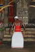SRI LANKA, Kandy, Temple of the Tooth (Dalada Maligawa), drummer at temple ceremony, SLK3458JPL