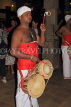 SRI LANKA, Kandy, Temple of the Tooth (Dalada Maligawa), drummer at temple ceremony, SLK3461JPL