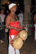 SRI LANKA, Kandy, Temple of the Tooth (Dalada Maligawa), drummer at temple ceremony, SLK3462JPL