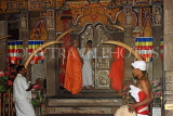 SRI LANKA, Kandy, Temple of the Tooth (Dalada Maligawa), monks entering main shrine, SLK3456JPL