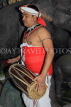 SRI LANKA, Kandy, cultural show, performer in traditional Kandyan dress, drummer, SLK5093JPL