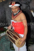 SRI LANKA, Kandy, cultural show, performer in traditional Kandyan dress, drummer, SLK5094JPL