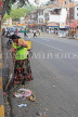 SRI LANKA, Kandy, town centre, road sweeper with traditional broom, SLK3658JPL
