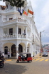 SRI LANKA, Kandy, town centre, three wheeler taxi going past Queens Hotel, SLK3867JPL