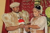 SRI LANKA, Kandy, traditional Kandyan Wedding, couple exchanging rings, SLK3716JPL
