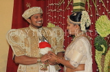 SRI LANKA, Kandy, traditional Kandyan Wedding, couple exchanging rings, SLK3717JPL