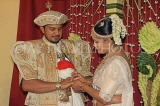SRI LANKA, Kandy, traditional Kandyan Wedding, couple exchanging rings, SLK4063JPL