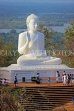 SRI LANKA, Mihintale temple site, giant seated Buddha staute, SLK5456JPL