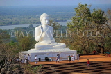 SRI LANKA, Mihintale temple site, giant seated Buddha staute, SLK5457JPL