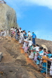 SRI LANKA, Mihintale temple site, prilgrims climbing the Aradhana Gala, SLK5402JPL