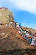 SRI LANKA, Mihintale temple site, prilgrims climbing the Aradhana Gala, SLK5404JPL
