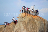 SRI LANKA, Mihintale temple site, prilgrims climbing the Aradhana Gala, SLK5411JPL
