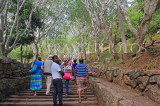 SRI LANKA, Mihintale temple site, prilgrims climbing the ancient granite stairway, SLK5397JPL
