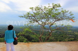 SRI LANKA, Mihintale temple site, visitor admiring the view, SLK5448JPL