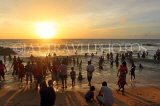 SRI LANKA, Negombo, Negombo Beach Park, Sunday crowds enjoying the sunset, SLK6291JPL